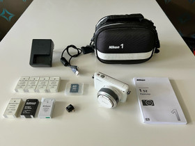 Nikon 1 S2 järjestelmäkamera, Kamerat, Kamerat ja valokuvaus, Oulu, Tori.fi Nikon 1 S2 järjestelmäkamera, Kamerat, Kamerat ja valokuvaus, Oulu, Tori.fi