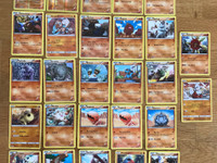 Taistelutyypin Pokémon-kortteja (27 kpl)
