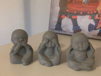 Kolme pientä Buddhaa