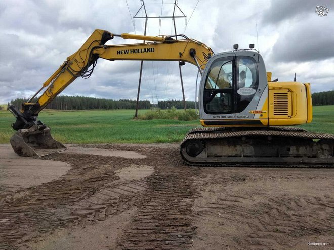 New Holland E 135 SR-1ES + Kallistaja Ja Indexator