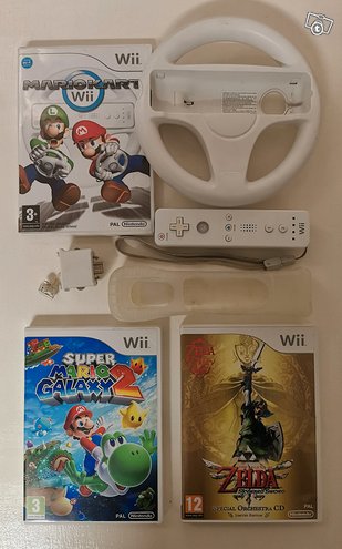 Wii-pelit + ohjain, ratti ja Motion-palikka, ...