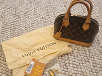 SACO LOUIS VUITTON em segunda mão durante 199 EUR em Vigo na WALLAPOP