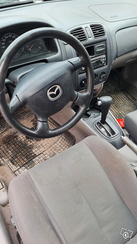 Mazda 323F 4