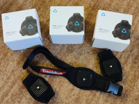 3kpl HTC Vive Tracker (2.0) ja Rebuff Reality TrackStrap sek TrackBelt