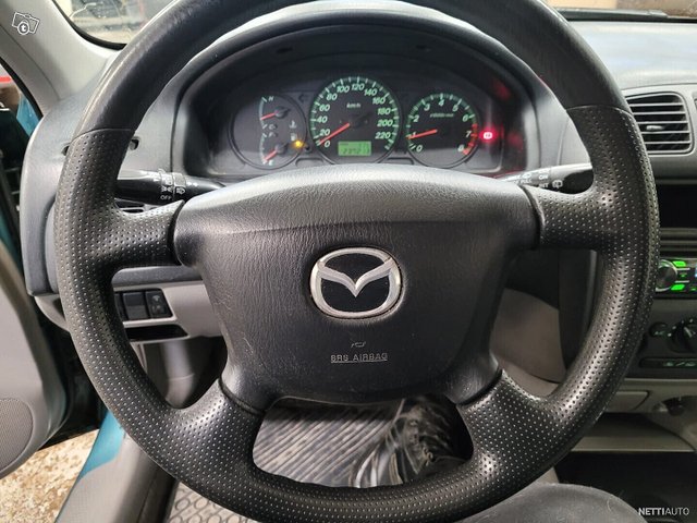 Mazda 323F 14