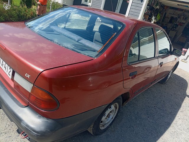 Nissan Almera 4