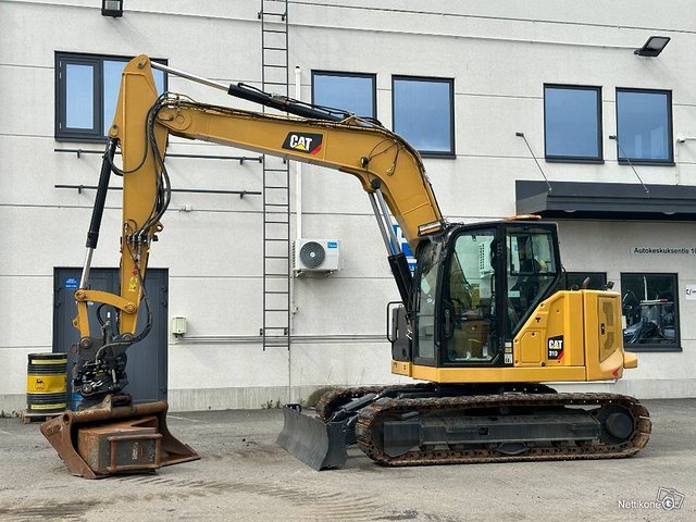 Cat 310 Rototilt 2-kauhaa, kuva 1