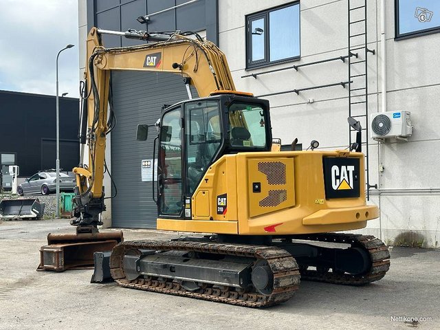 Cat 310 Rototilt 2-kauhaa 3