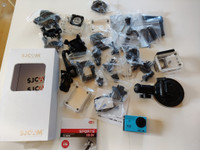 SJCAM SJ4000 action-kamera + tarvikkeet
