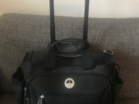 Travelpro vedettv/kannettava matkalaukku